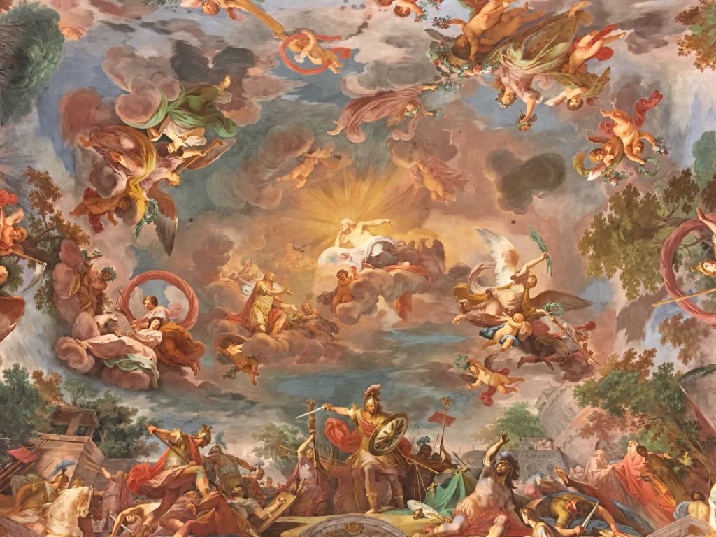 The main entrance hall ceiling of the Borghese Gallery by Mariano Rossi.  Consider booking a private tour in Rome at the Borghese Gallery.
