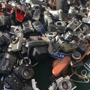 Old cameras at a flea market stand in Anguillara Sabazia Rome.